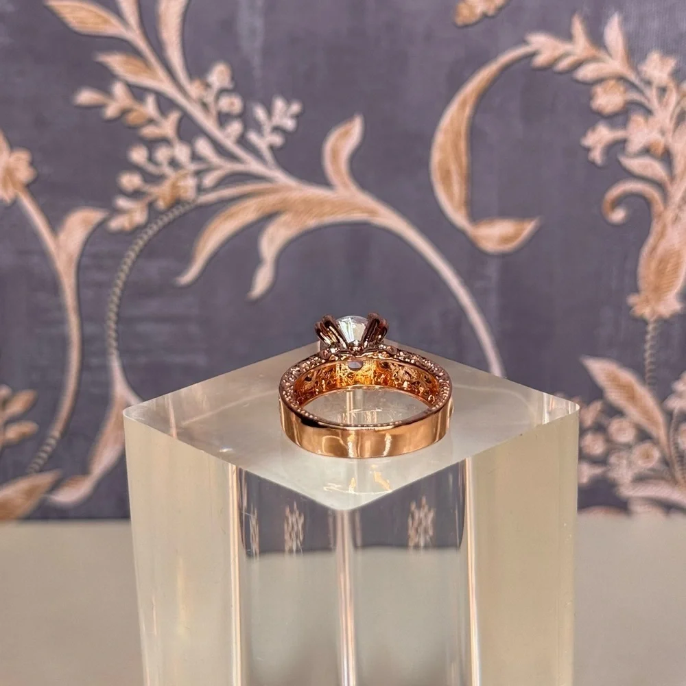 Estate rose gold tone solitaire crystal ring with intricate vine cutwork Lot D71